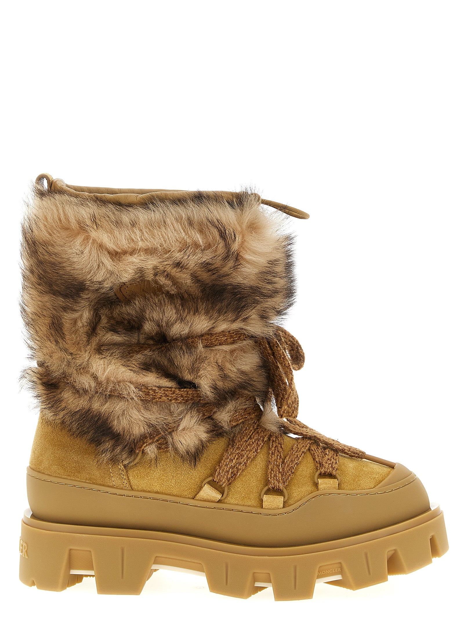 Bottes plates en cuir de veau marron Moncler, style élégant et confortable pour femmes.