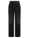 Jeans droits en coton noir de Balenciaga, vue frontale, avec ceinture et détails classiques.