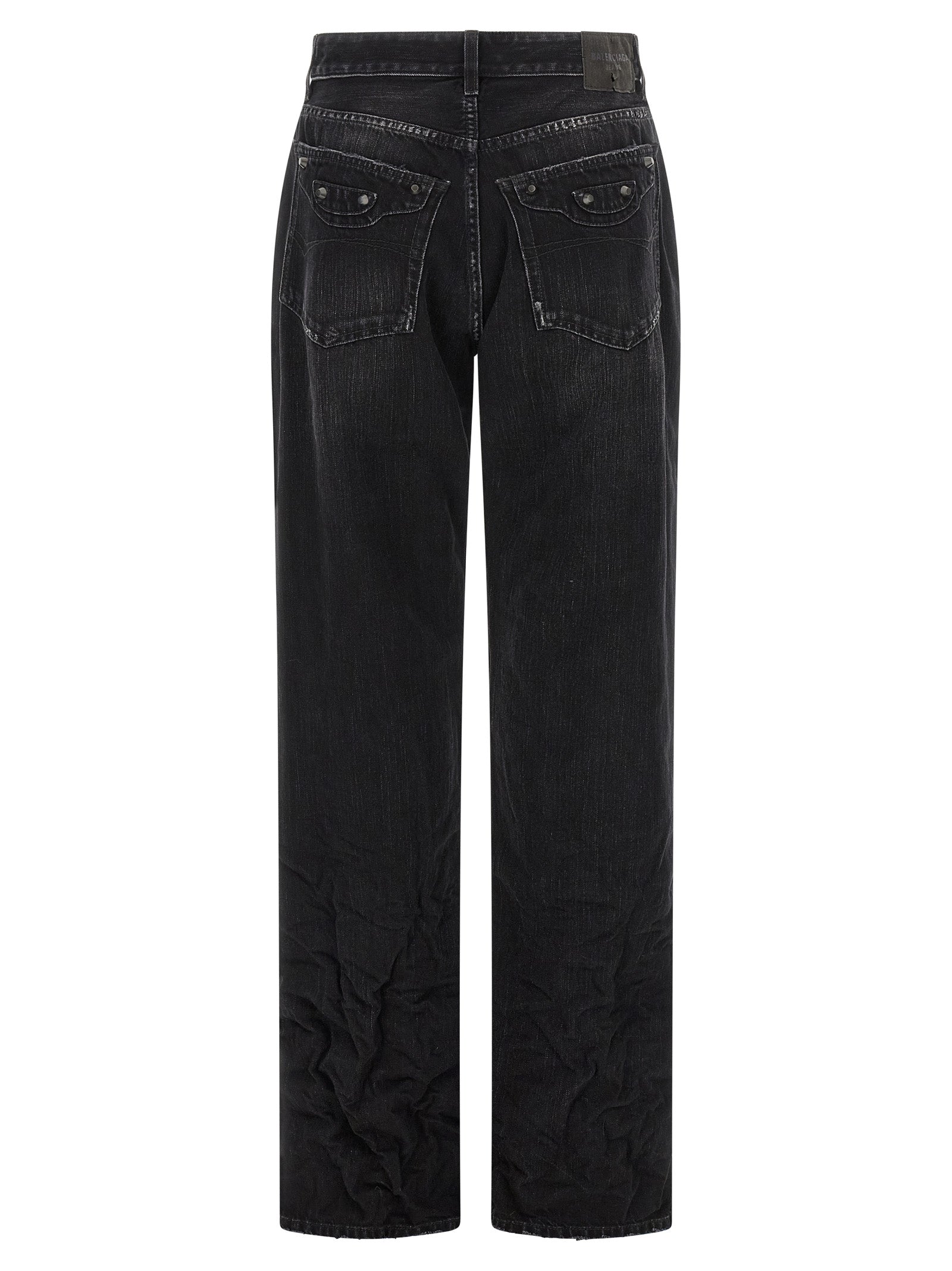 Jeans droits en coton noir de Balenciaga, style classique et coupe ajustée, visibles devant avec détails de couture.