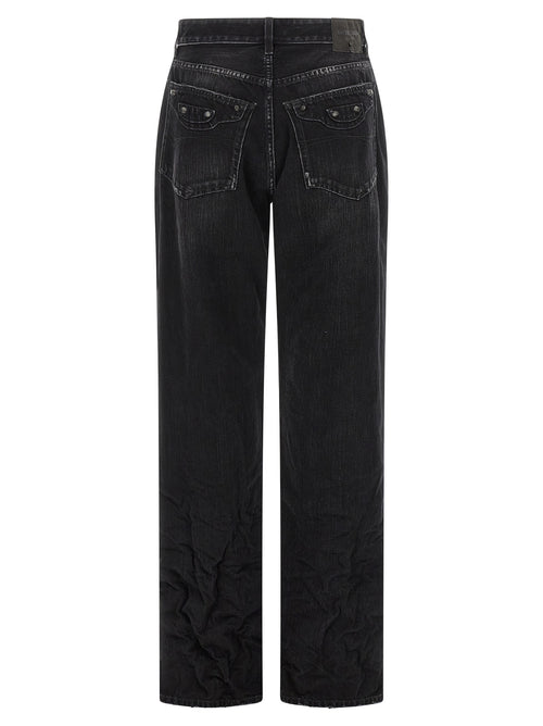 Jeans droits en coton noir de Balenciaga, style classique et coupe ajustée, visibles devant avec détails de couture.