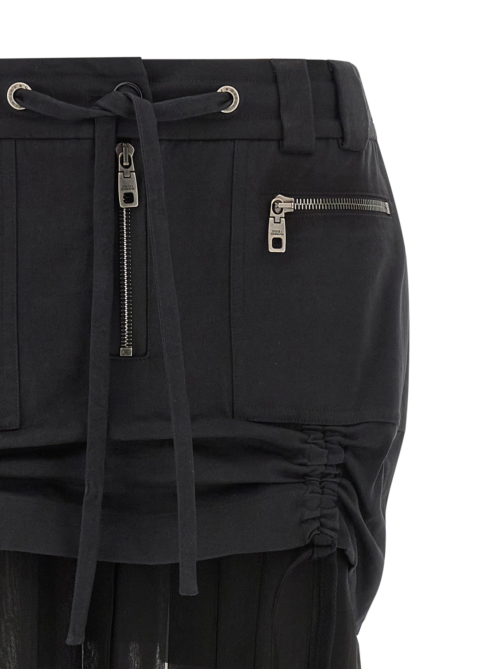 Jupe midi en soie noire de Dolce & Gabbana, élégante et fluide, avec coupe ajustée et finition sophistiquée.