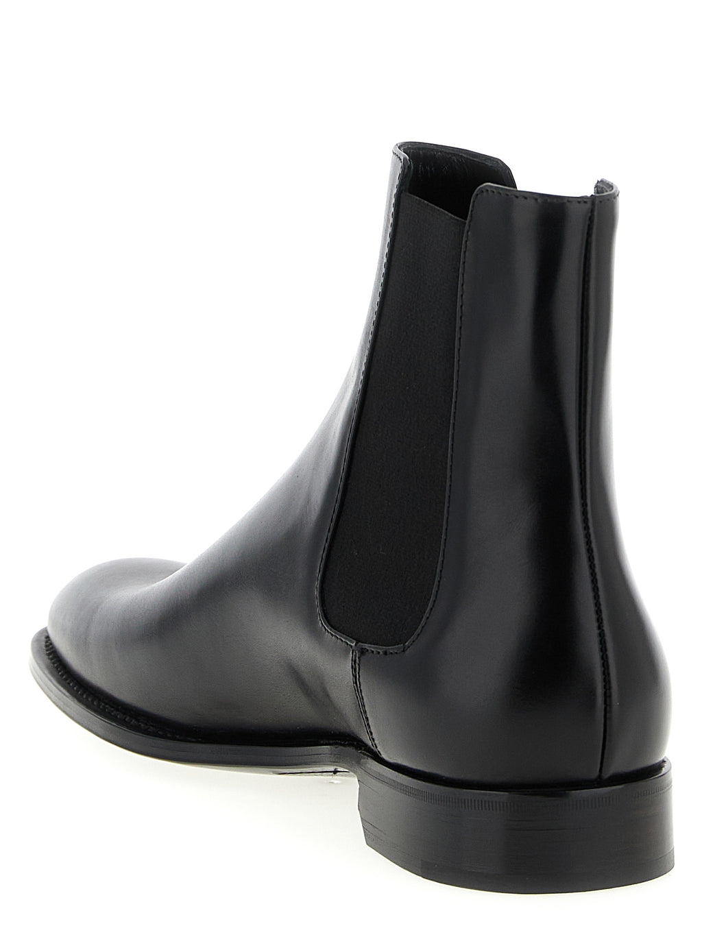 Bottes Chelsea en cuir de veau noir Saint Laurent, style élégant et sophistiqué, vue de face sur fond blanc.