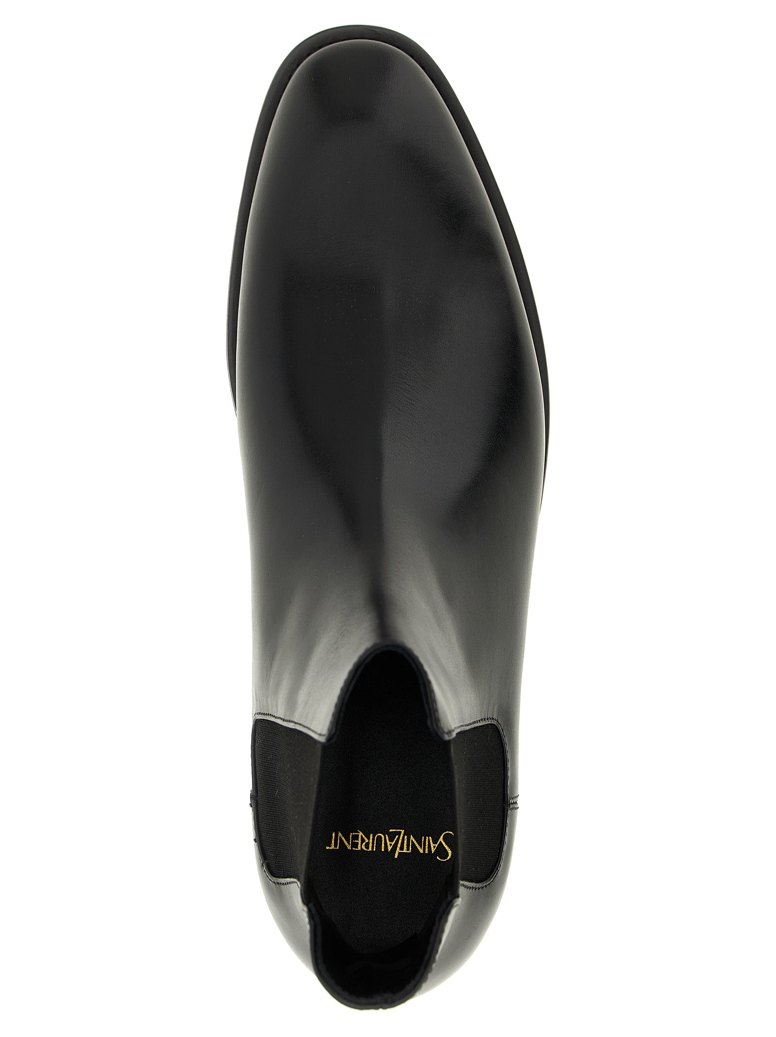 Bottes Chelsea en cuir de veau noir de Saint Laurent, style élégant et sophistiqué, avec semelles et détails en cuir.
