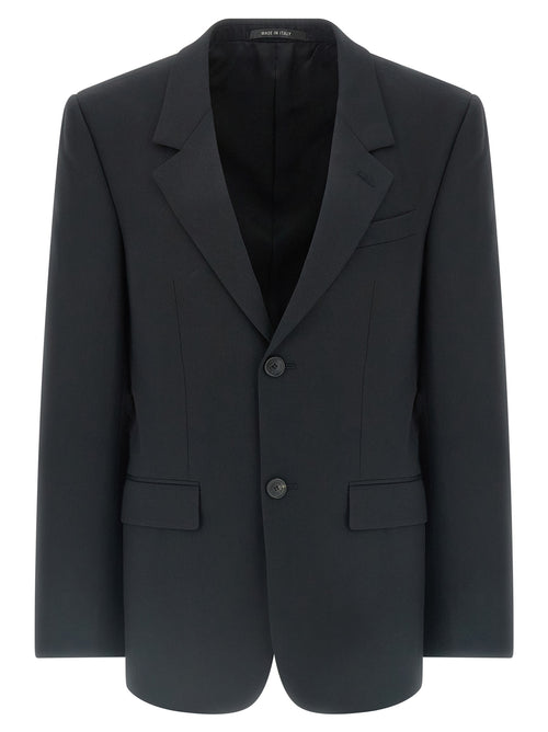 Veste blazer en laine noire de Balenciaga, élégante et moderne, portée sur un mannequin.