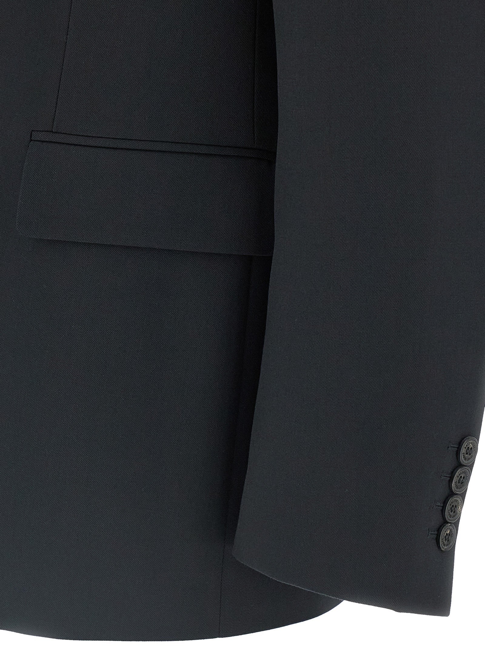 Blazer en laine noire Balenciaga, veste élégante pour homme ou femme, tissu doux et coupe moderne visible sur l'image.