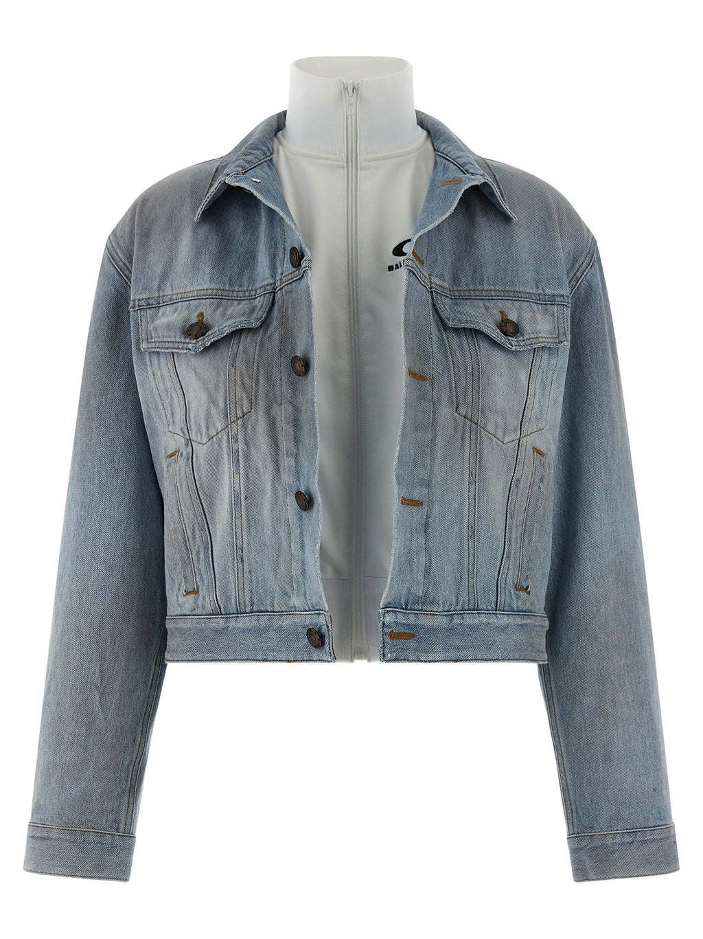 Veste en jean en coton bleu Balenciaga, coupe classique avec détails de style moderne, visible sur l'image.