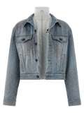 Veste en jean en coton bleu Balenciaga, coupe classique avec détails de style moderne, visible sur l'image.