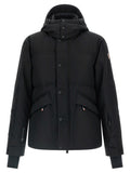 Veste Moncler Grenoble en polyester noir, coupe ajustée, avec capuche et fermeture zippée, vue de face.