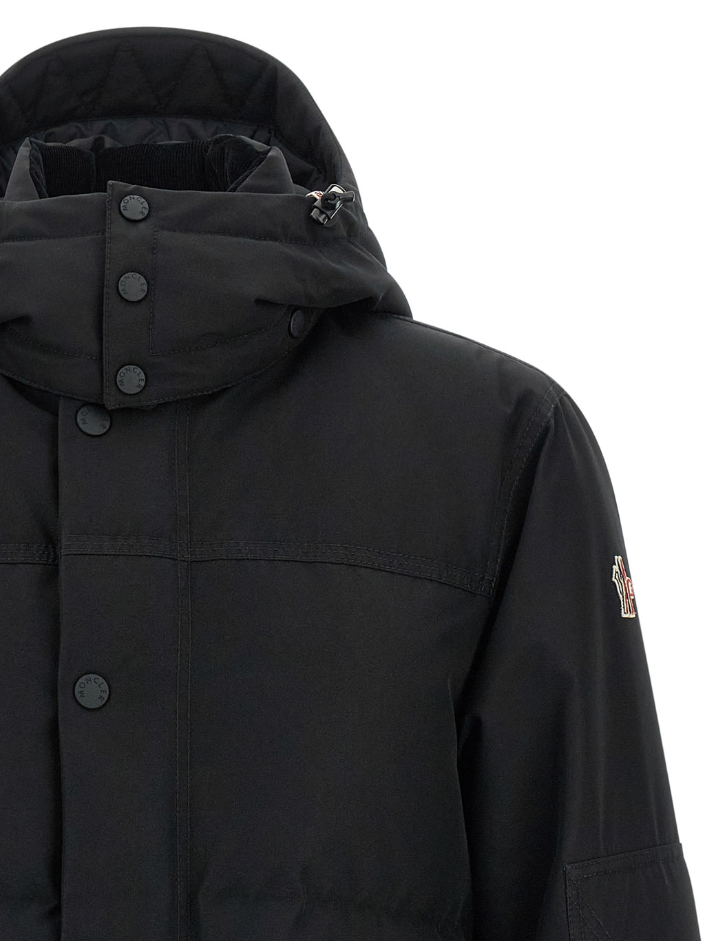 Veste shell en polyester noire Moncler Grenoble, coupe ajustée avec capuche et fermetures zippées, pour un style élégant et sportif.