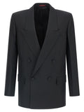 Blazer noir en polyester de Gucci, veste élégante avec coupe ajustée et détails modernes, portée sur un mannequin.