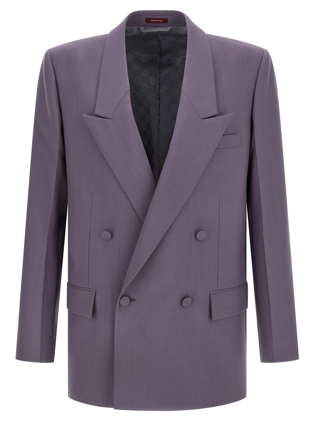Veste blazer en laine violette de Gucci, coupe élégante, portée sur un fond neutre, mettant en valeur le tissu et la finition haut de gamme.