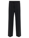 Pantalon de costume Gucci noir en polyester, coupe élégante avec ceinture et plis, pour homme ou femme.
