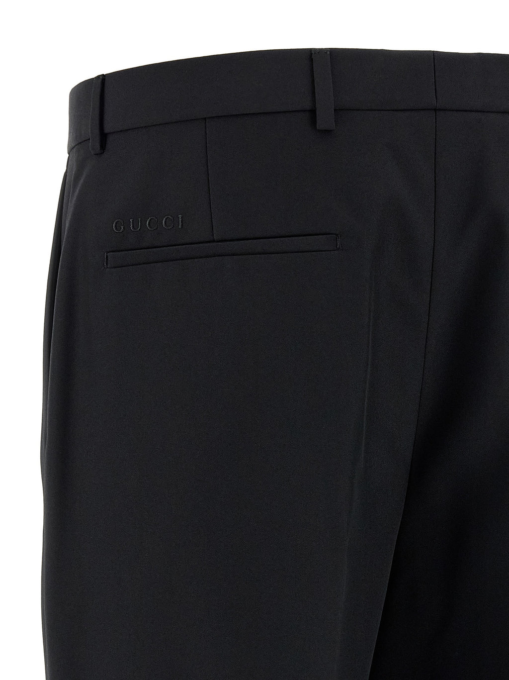 Pantalon de costume en polyester noir Gucci pour femme, avec une coupe élégante et détails raffinés.