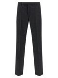 Pantalon gris en laine Gucci pour homme, coupe élégante et tissu de haute qualité, visible sur cette image.