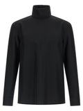 Chemise en polyester noir Gucci pour femme, coupe élégante et détails raffinés, visible sur l'image.