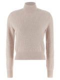 Cardigan en laine multicolore Fendi avec motifs, porté sur un mannequin, détails colorés et texture visible.