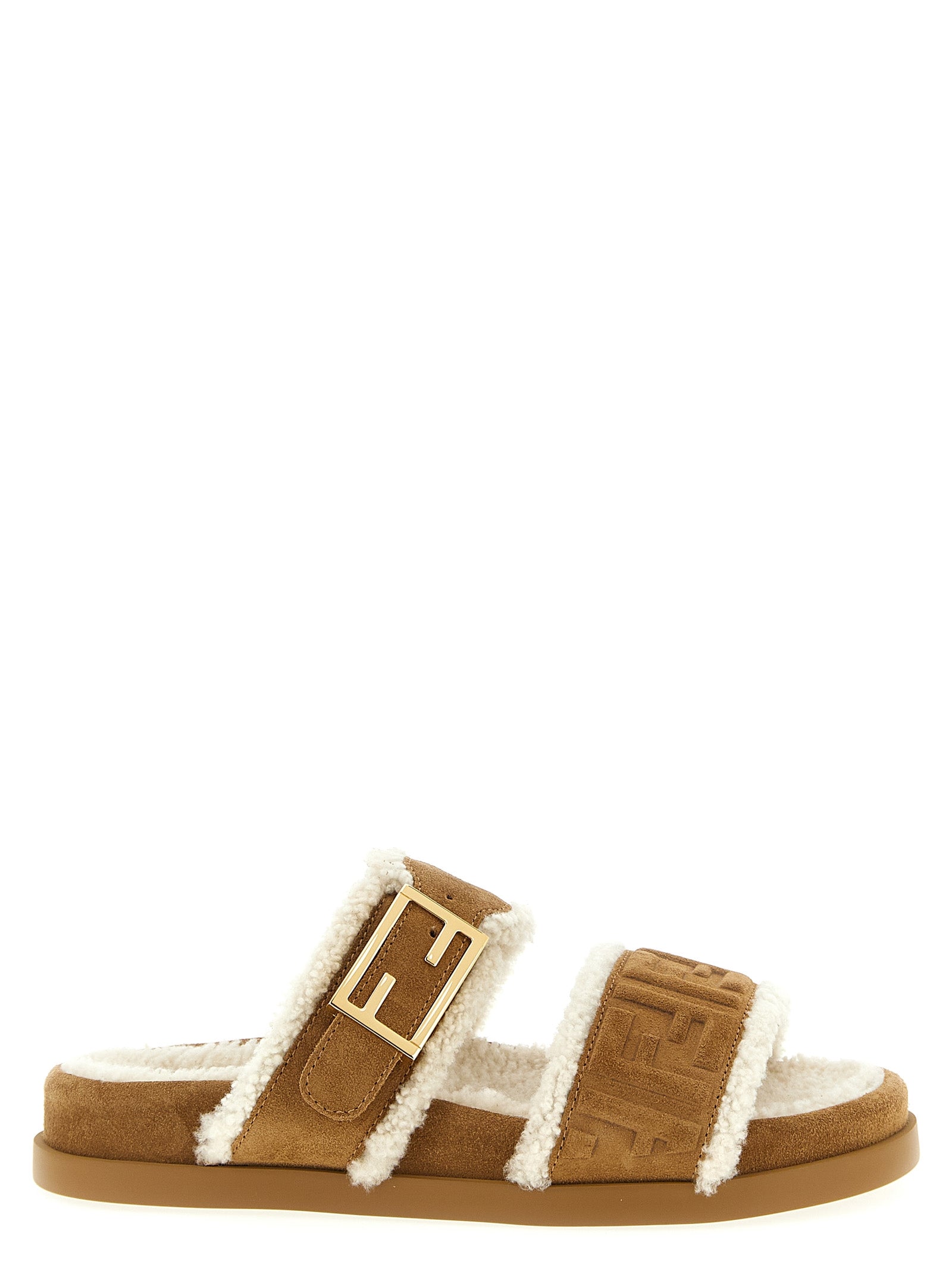 Sandales Fendi en cuir de veau beige, style slides avec design élégant et confortable.