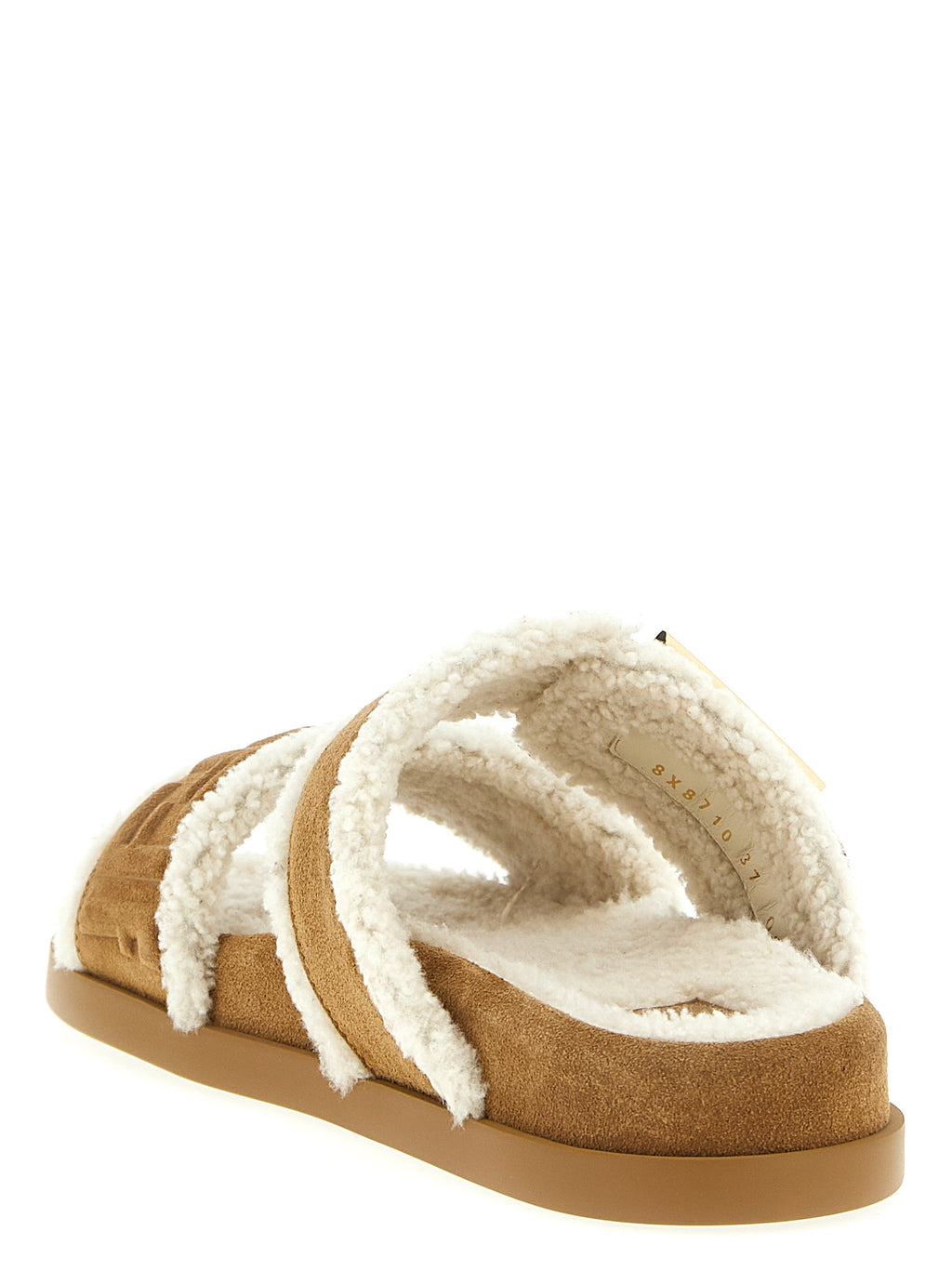 Sandales Fendi en veau beige, slides élégantes avec design épuré, parfaites pour un style sophistiqué.