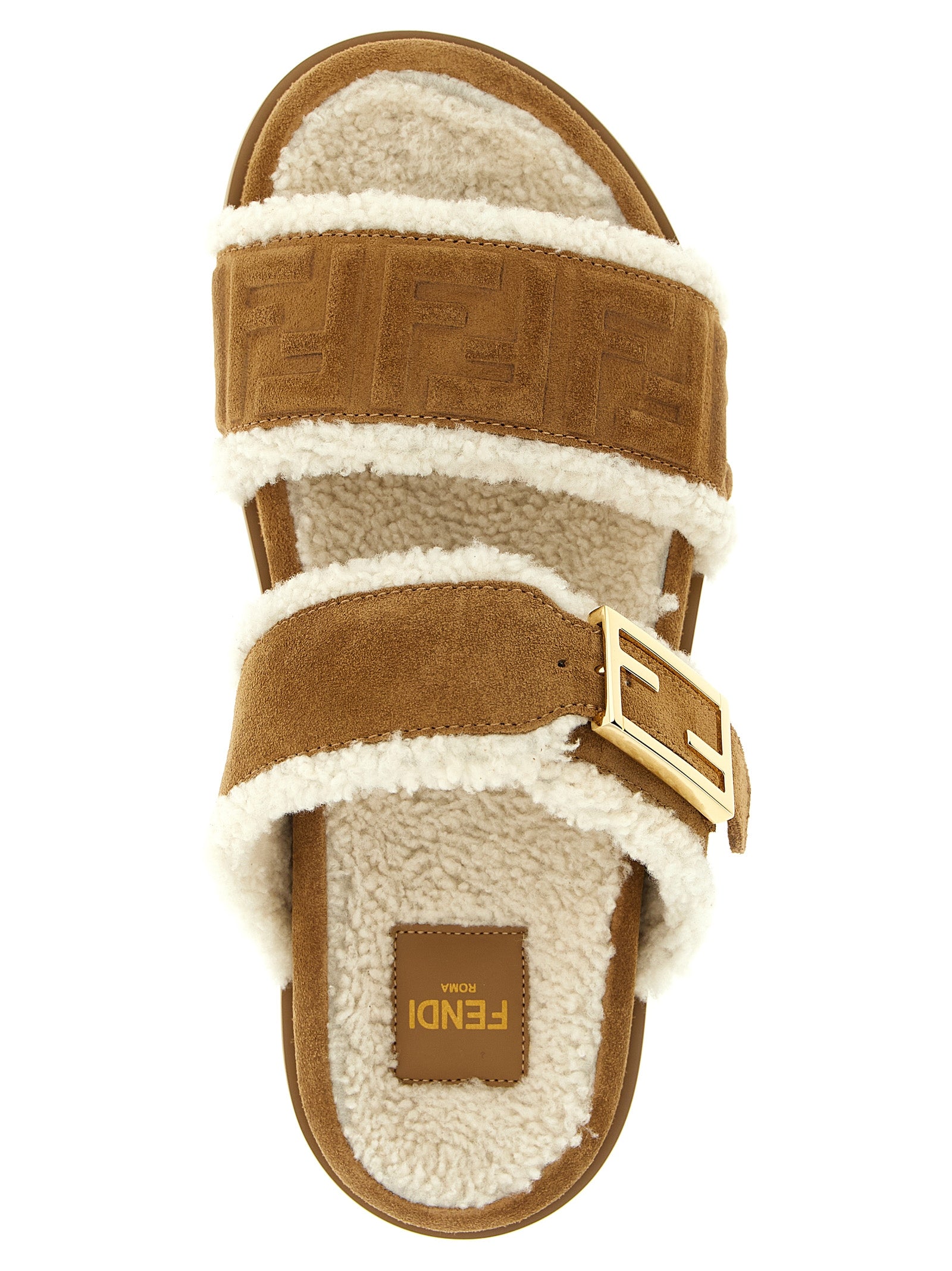 Sandales Fendi en cuir de veau beige, élégantes et confortables, avec design épuré et logo discret.