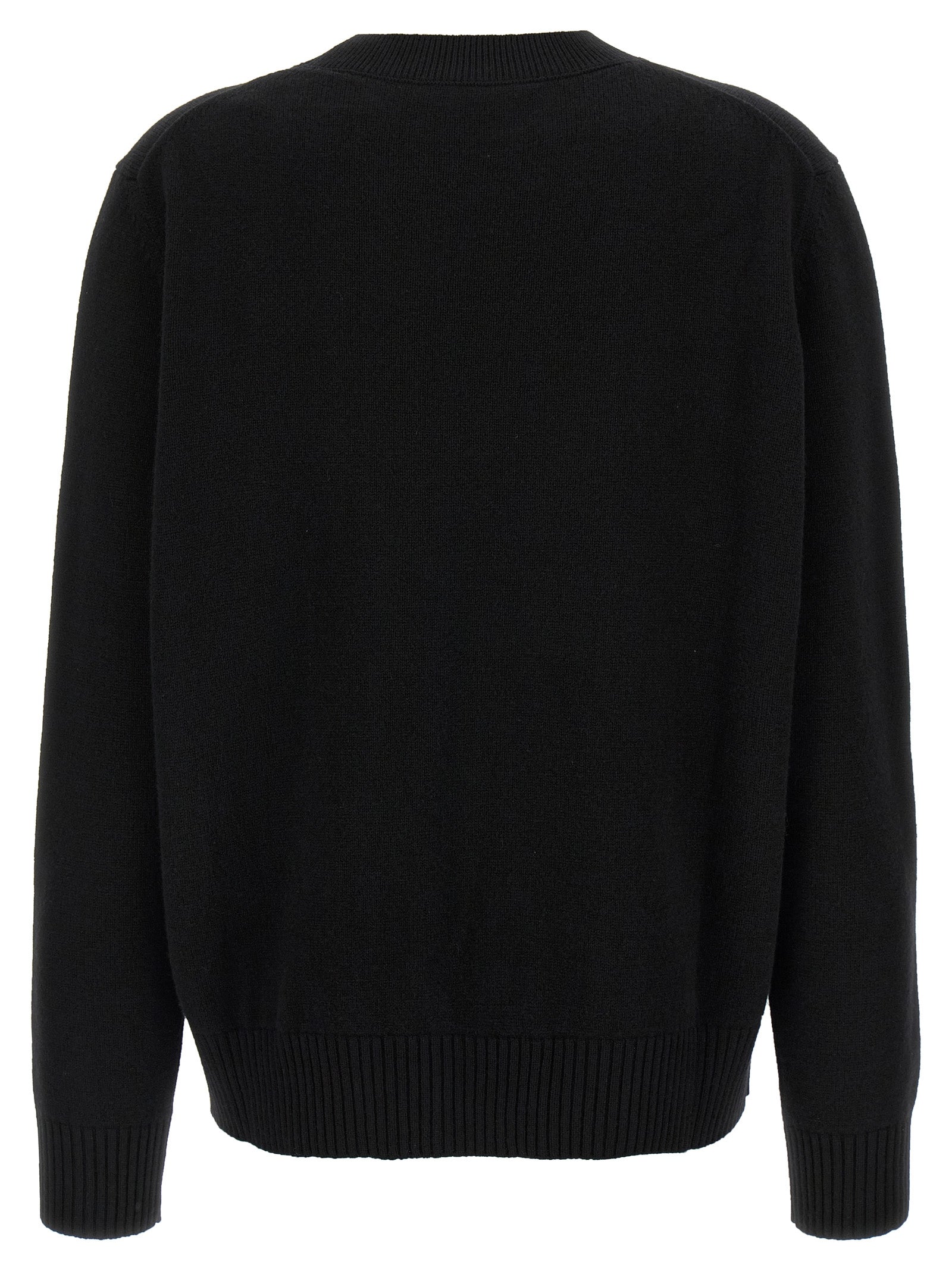 Cardigan en laine noire Givenchy, vêtement homme ou femme, avec détails de texture visible sur l'image.