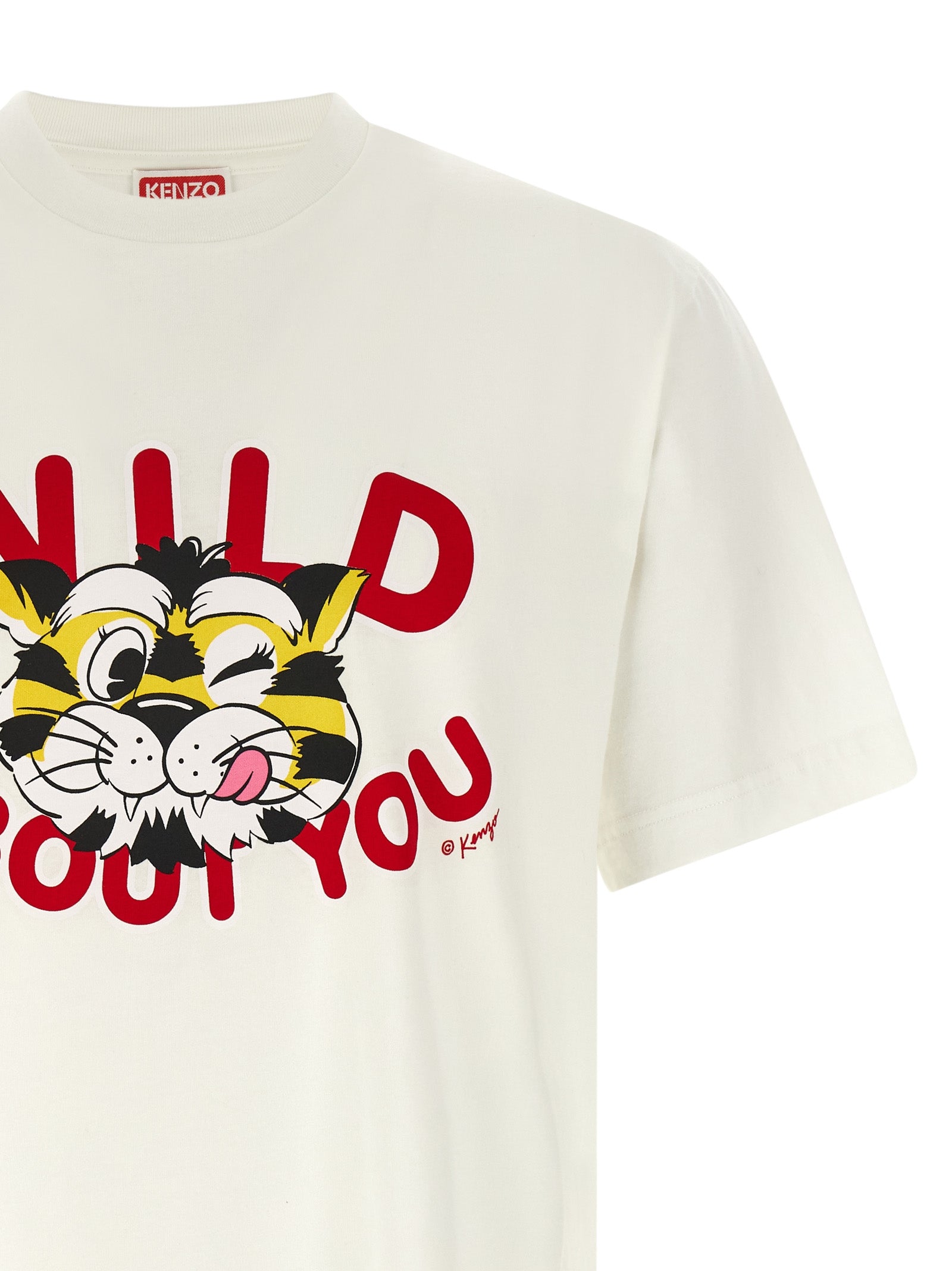 T-shirt blanc en coton de la marque Kenzo, coupe classique, avec logo discret sur le devant.