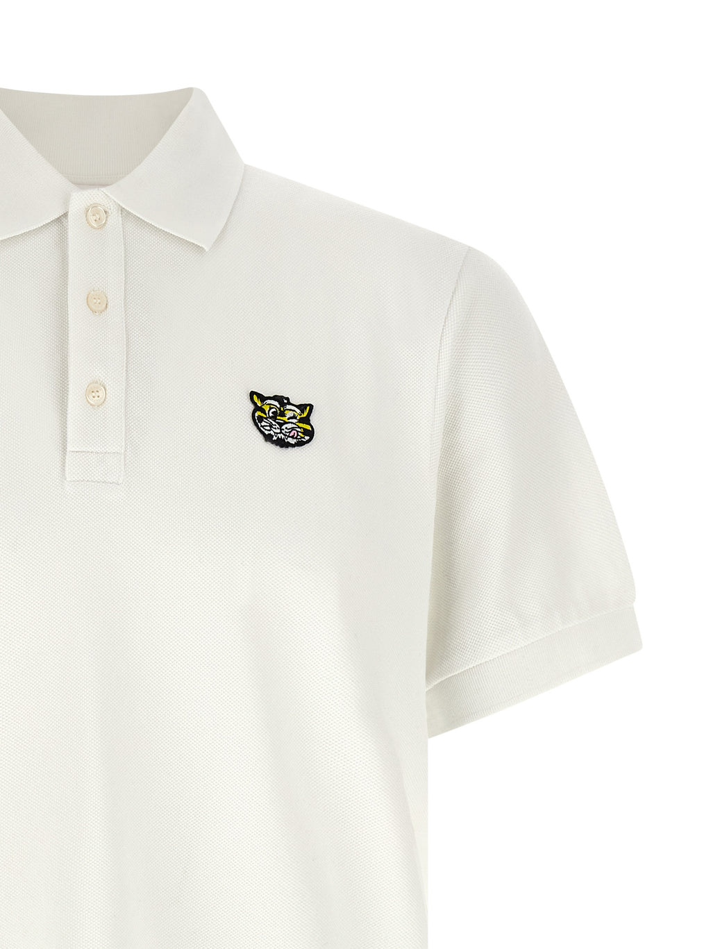 Chemise polo blanche en coton de la marque Kenzo, avec col classique et logo discreet visible.