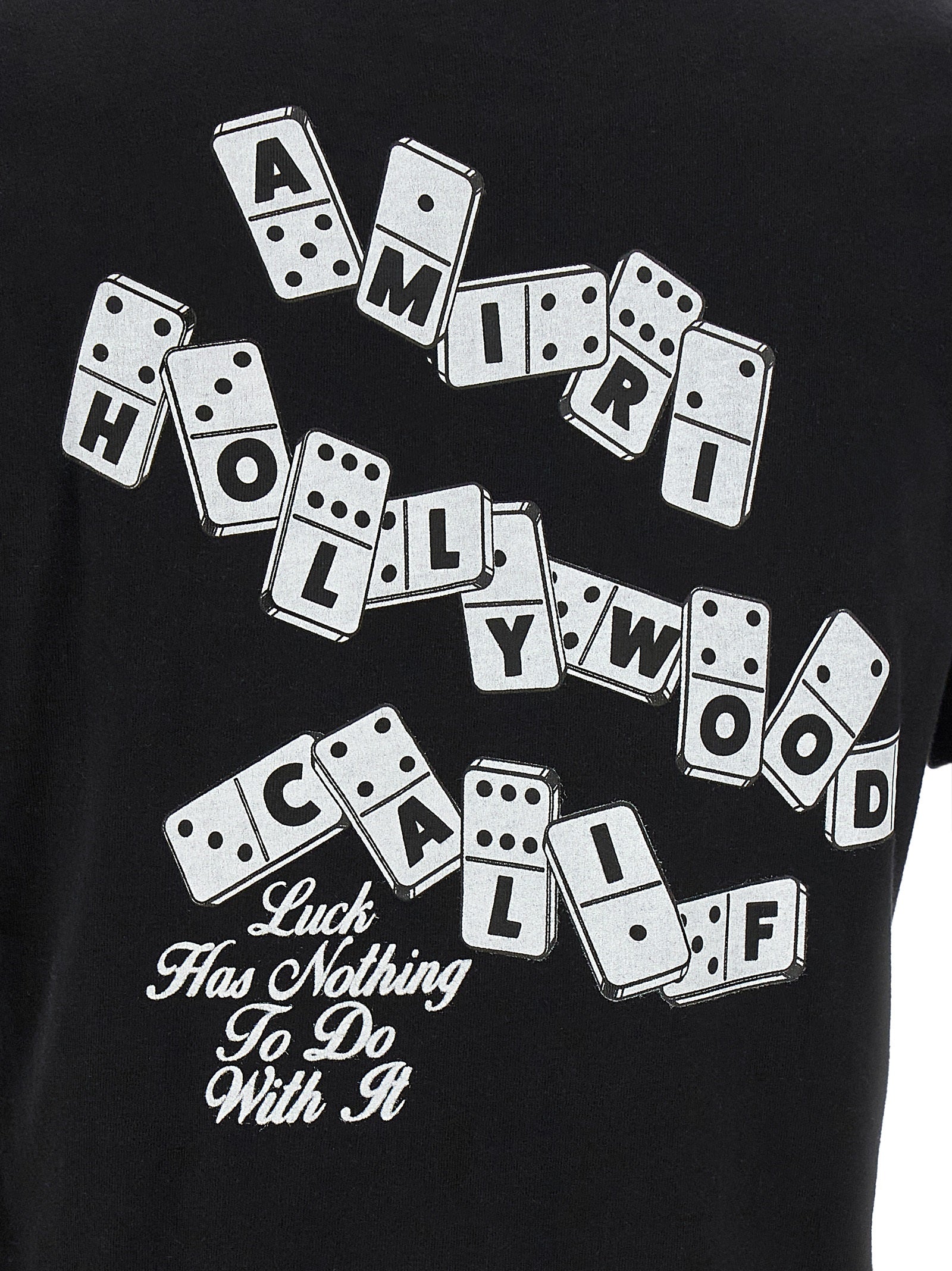T-shirt noir en coton de la marque Amiri, vue de face avec col rond et logo discret sur la poitrine.