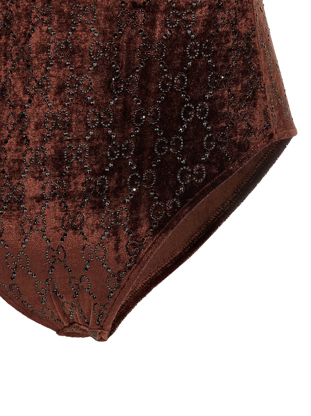Combinaison en polyamide marron de Gucci, corps moulant avec détails élégants, portée sur un mannequin.