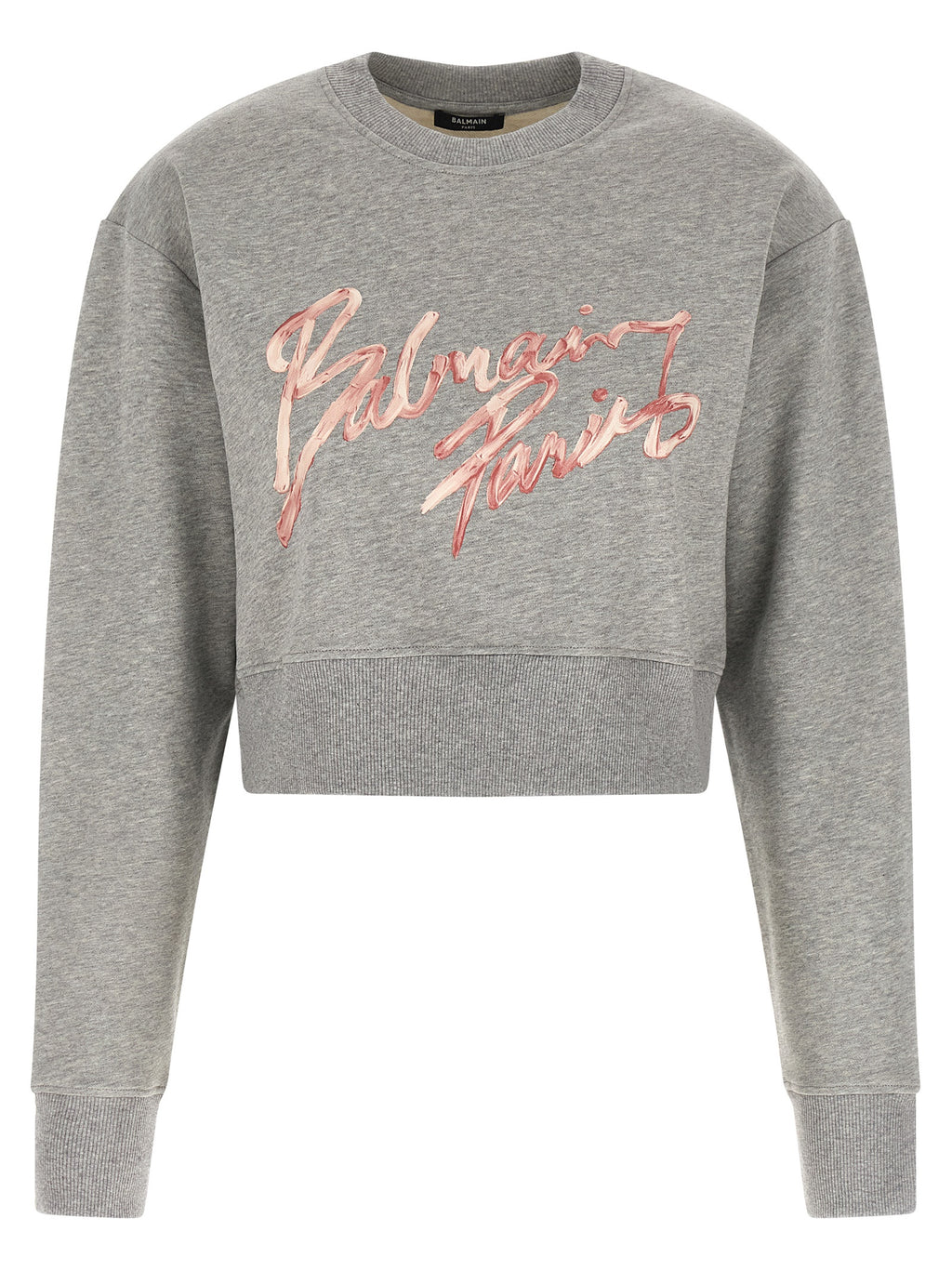 Sweatshirt gris en coton de Balmain, vêtement décontracté avec logo, porté sur un mannequin.