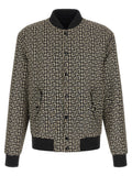 Veste bomber noire en polyamide de la marque Balmain, avec détails sophistiqués et coupe moderne.