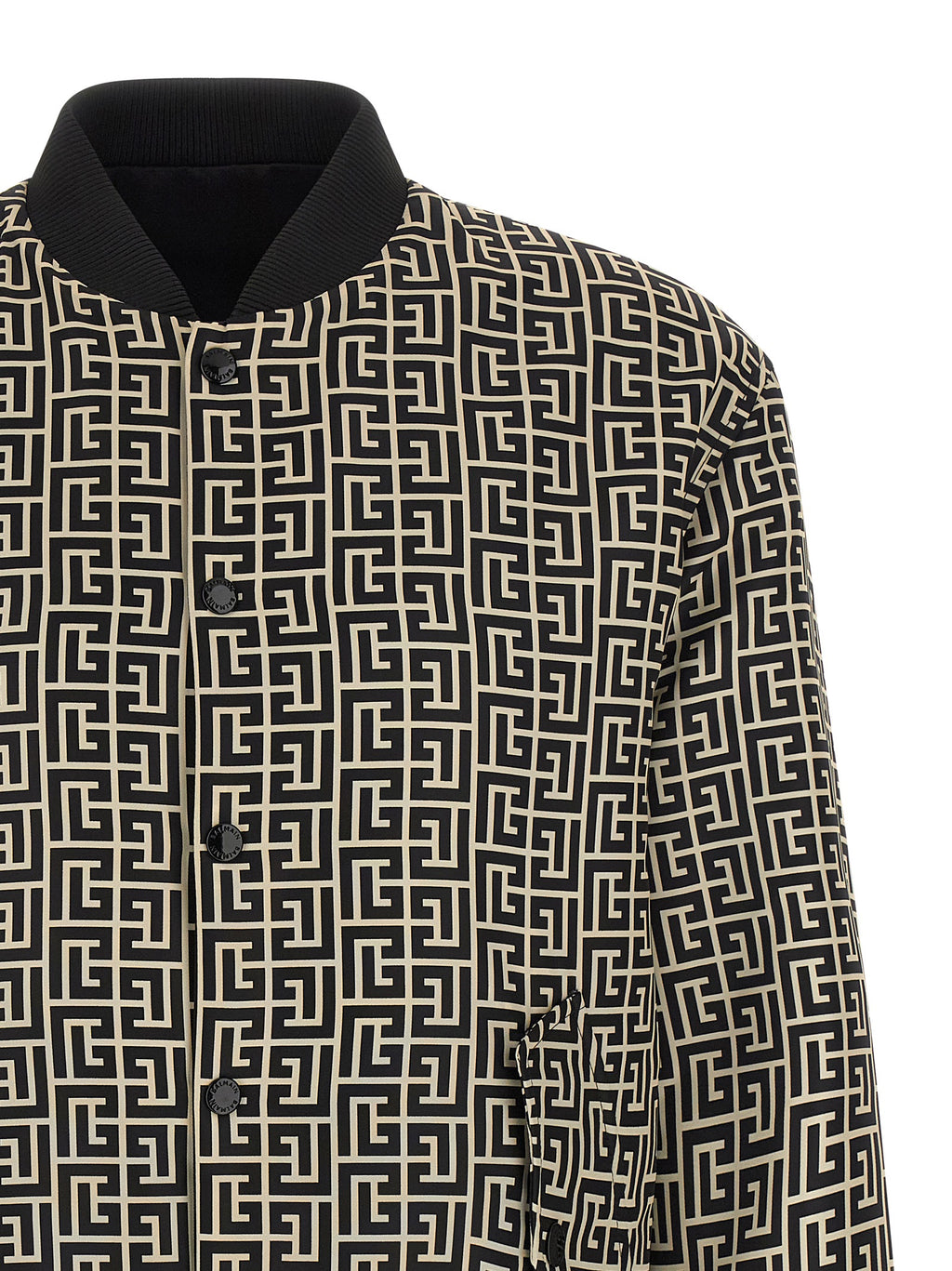 Veste bomber noire en polyamide de la marque Balmain, avec détails modernes et coupe élégante.