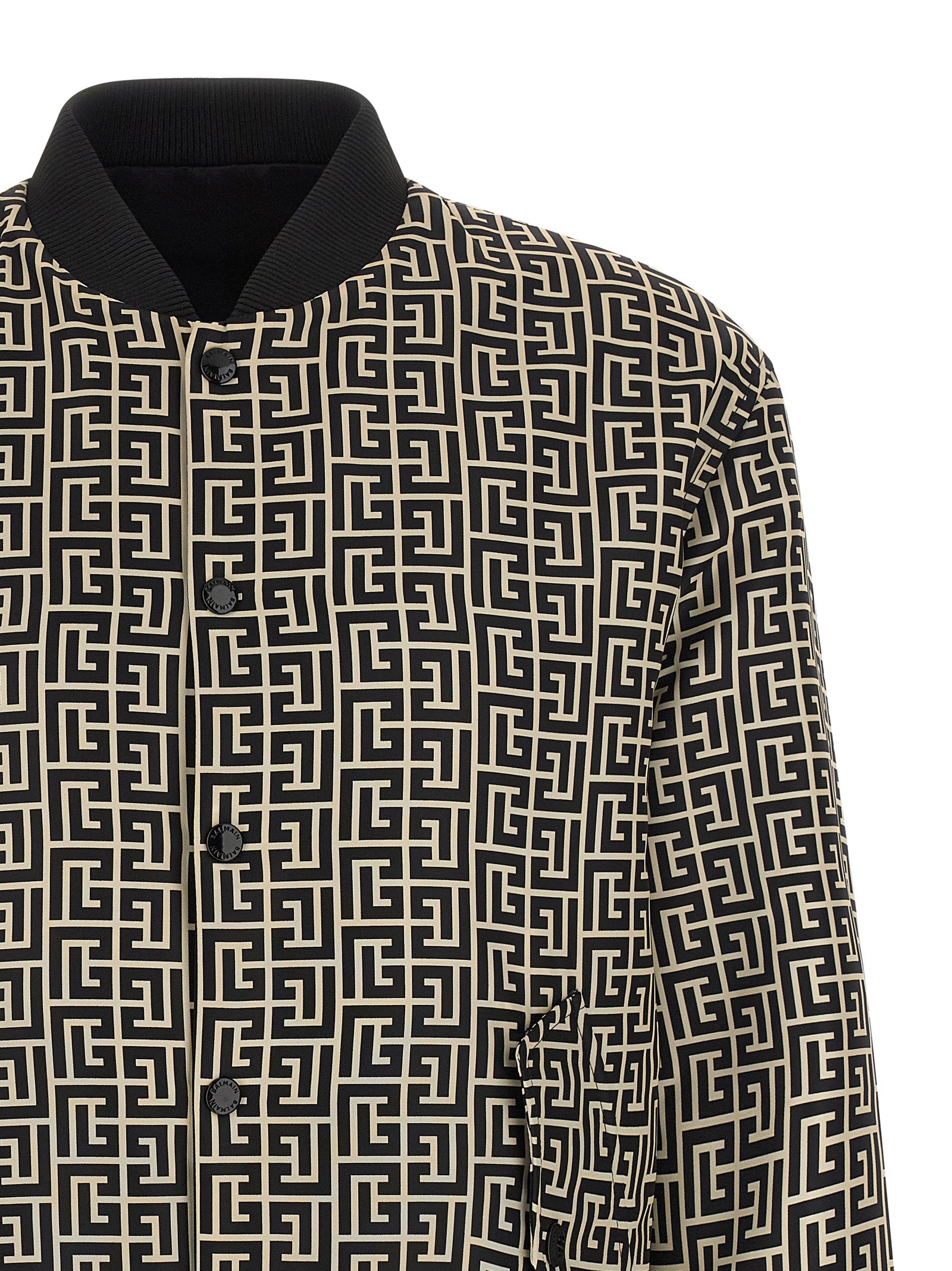 Veste bomber noire en polyamide de la marque Balmain, avec détails modernes et coupe élégante.
