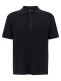 Chemise polo en laine bleue Balmain, vue détaillée du tissu et du col, style élégant et sophistiqué.