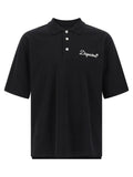 Chemise polo en coton noir de la marque Dsquared², avec col classique et logo discret, sur fond neutre.