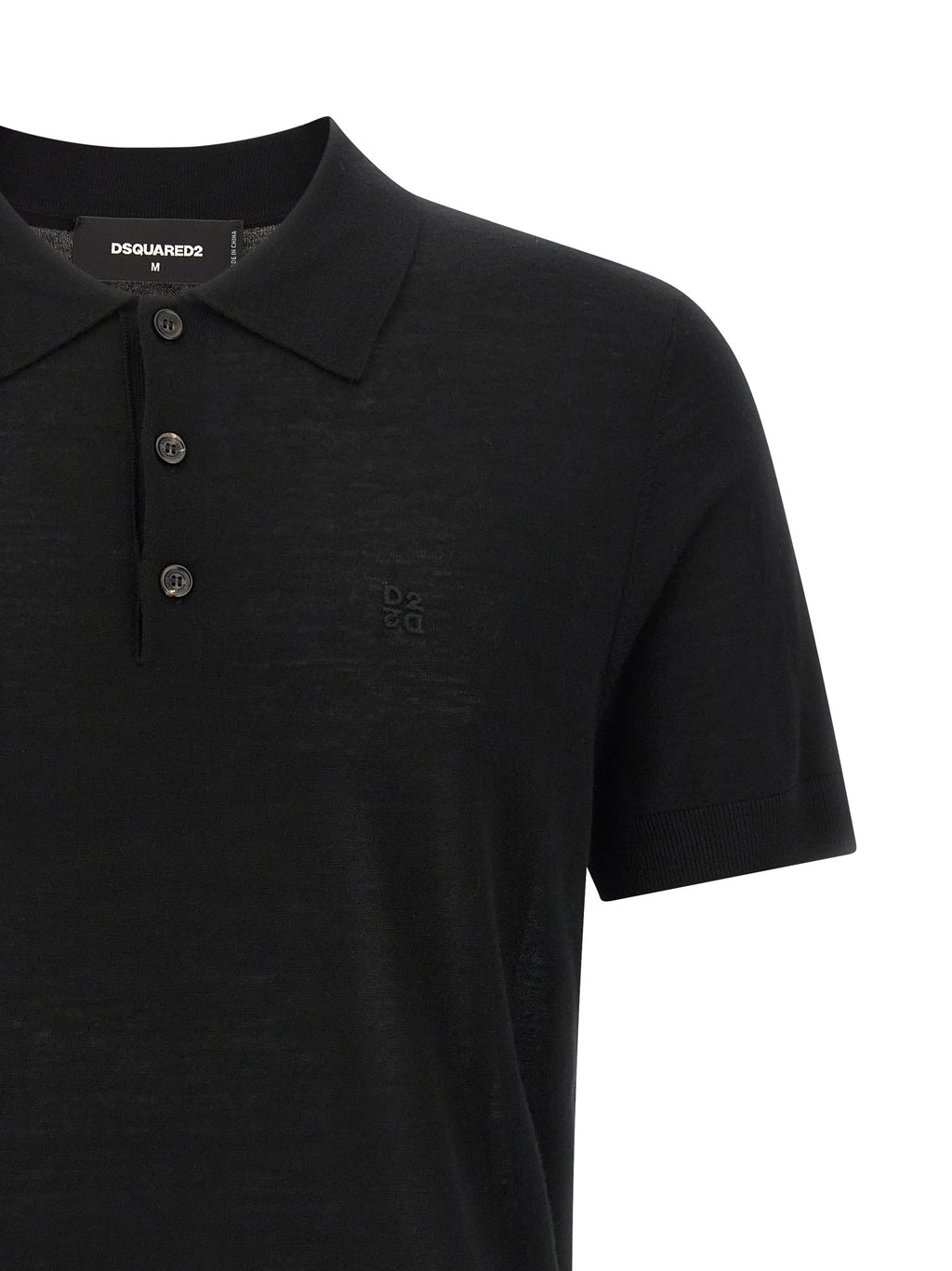 Polo en laine noire Dsquared², élégant et classique, avec col et boutons, porté sur un mannequin.