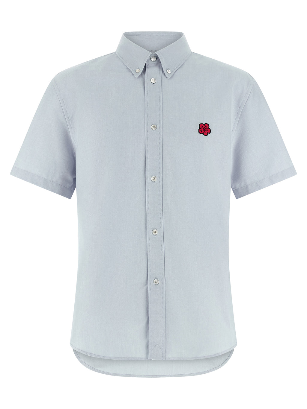 Chemisier en coton bleu de la marque Kenzo, avec détails stylés et coupe élégante, porté sur un mannequin blanc.