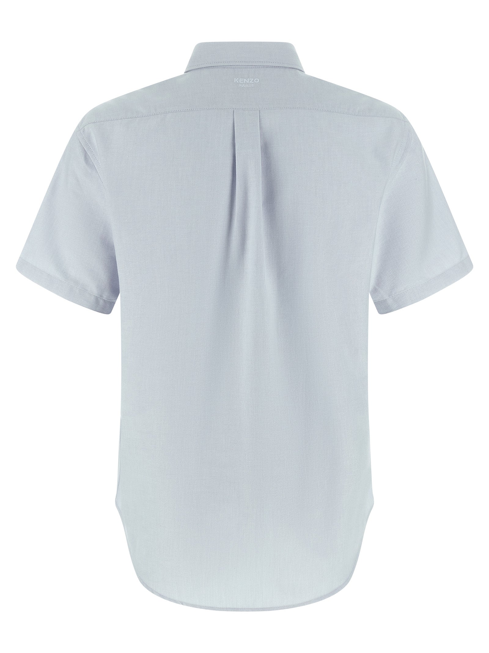 Chemise en coton bleue de la marque Kenzo, détails du tissu et coupe élégante visible sur l'image.