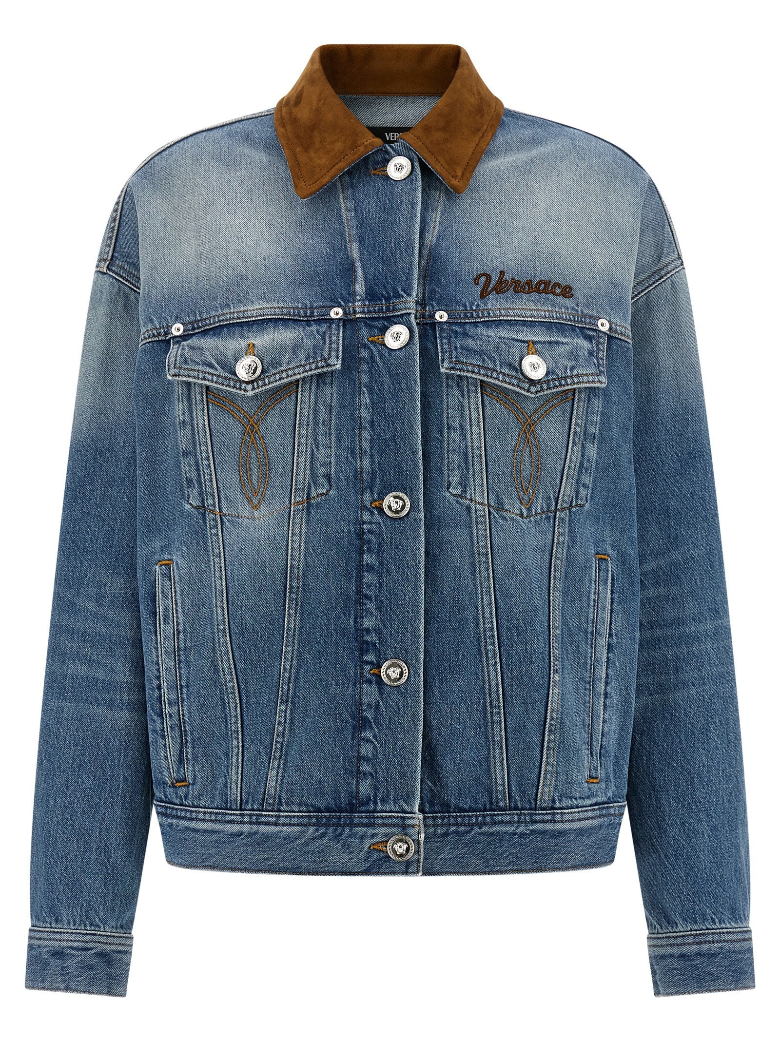 Veste en denim en coton bleu de la marque Versace, avec détails de luxe et coupe élégante visible sur l'image.
