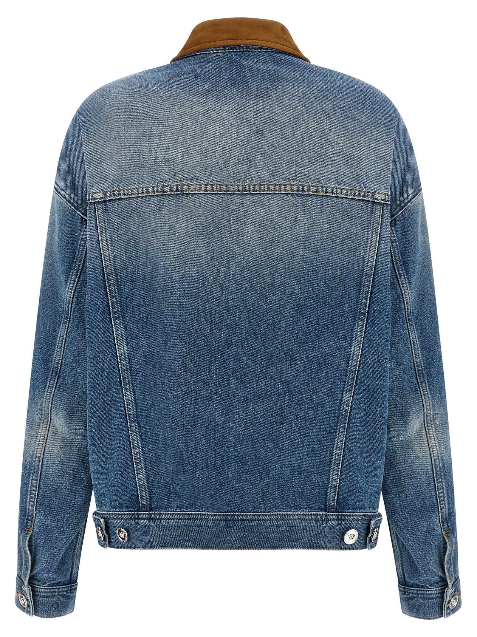 Veste en denim en coton bleu de la marque Versace, détail stylé avec logo et coupe moderne.
