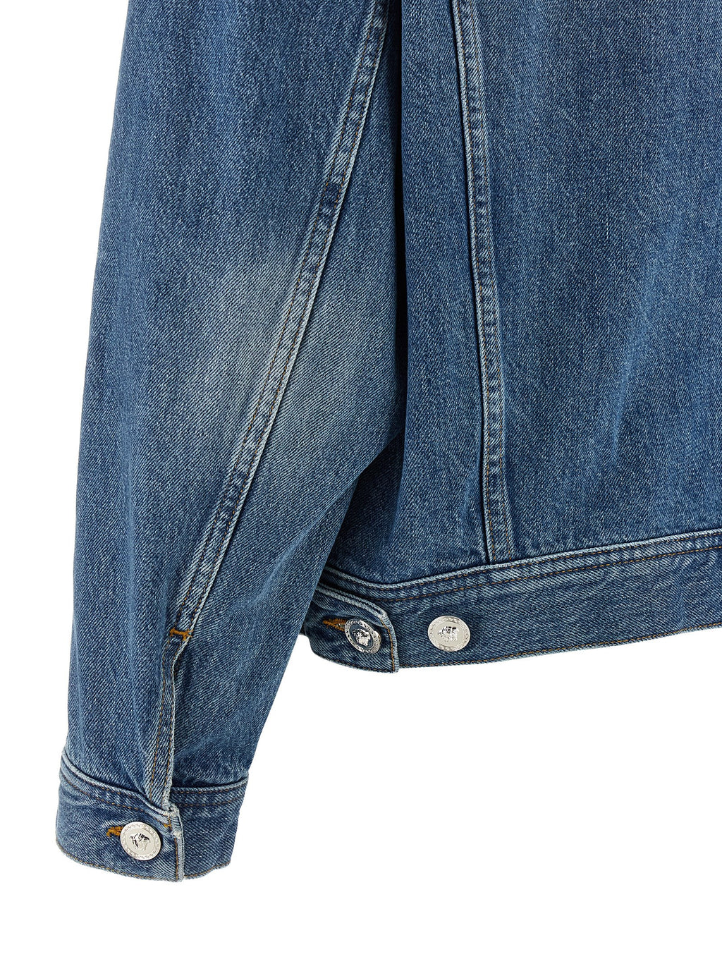 Veste en denim bleu en coton de Versace, avec logo distinctif, style décontracté et détails modernes.