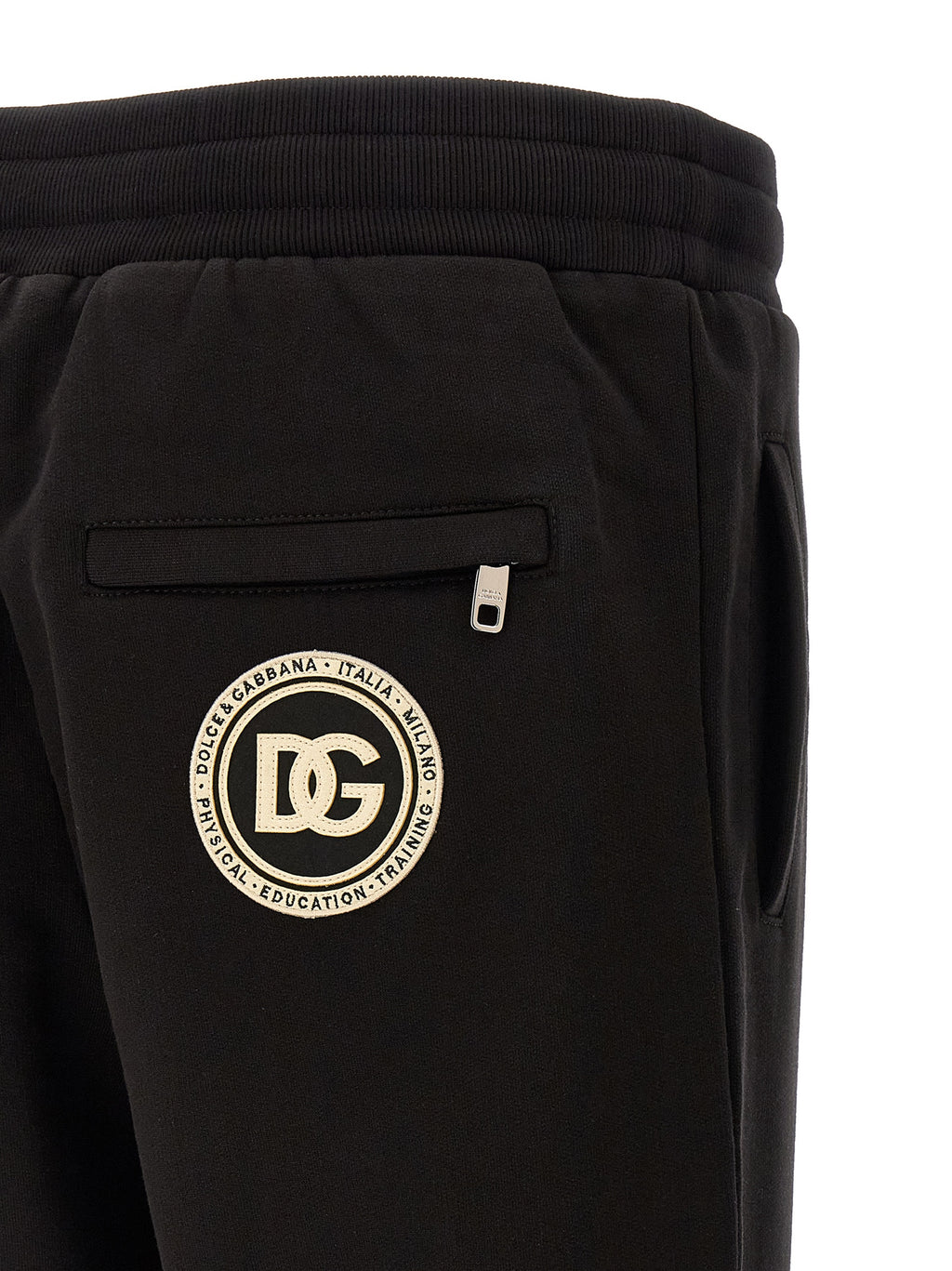 Pantalons de jogging en coton noir Dolce & Gabbana pour homme, détails de la coupe décontractée et logo sur la jambe.