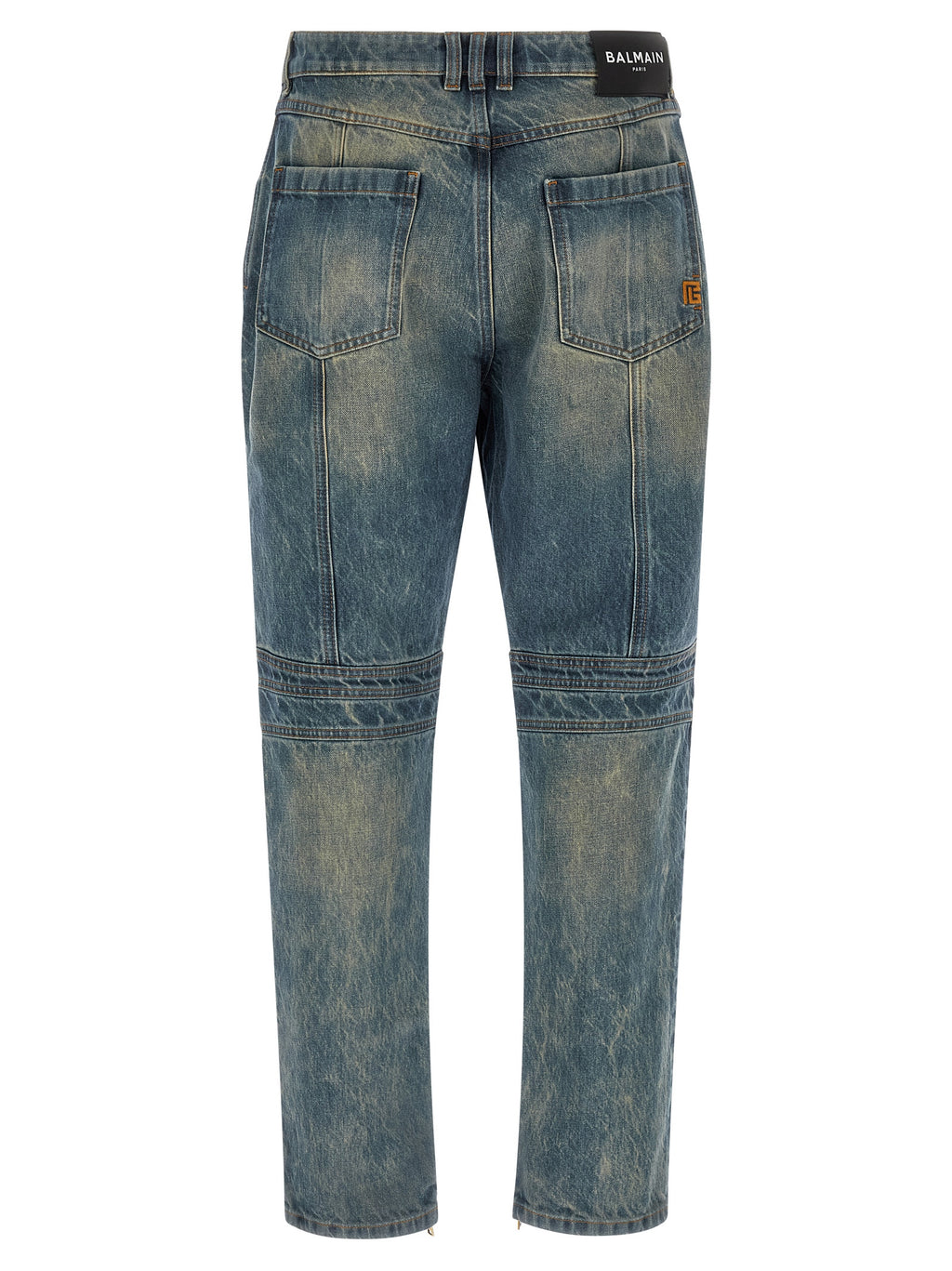 Jeans droits en coton bleu de Balmain, modèle classique, avec coupe droite et finition soignée, visible sur l'image.