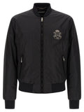 Veste bomber noire en polyamide de Dolce & Gabbana, coupe moderne et élégante, avec fermeture éclair et détails tendance.