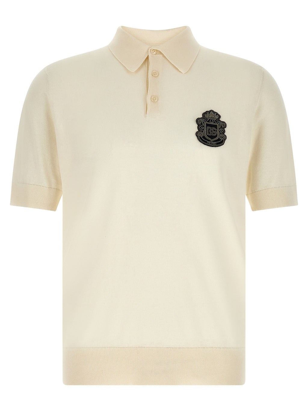 Chemise polo blanche en coton Dolce & Gabbana avec col classique et logo discret, vue de face.