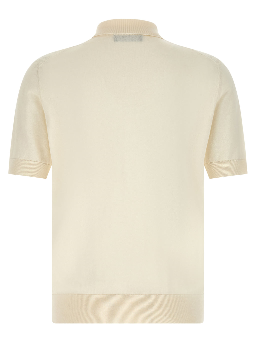 Chemise polo blanche en coton de Dolce & Gabbana, détail du tissu et col classique visible sur l'image.