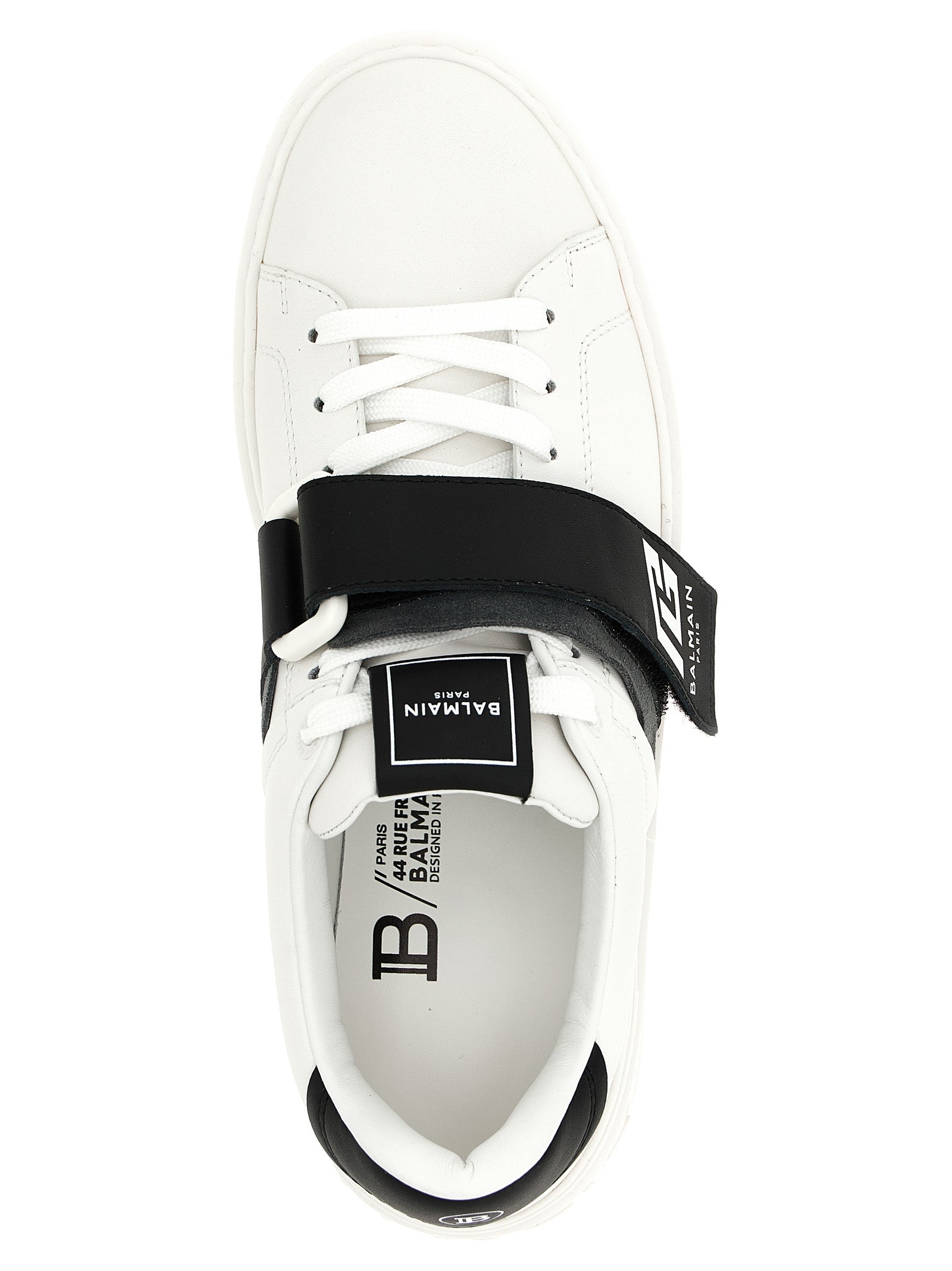 Chaussures sneakers basses Balmain Bicolor en cuir de veau, style moderne et élégant, visibles avec détails colorés.