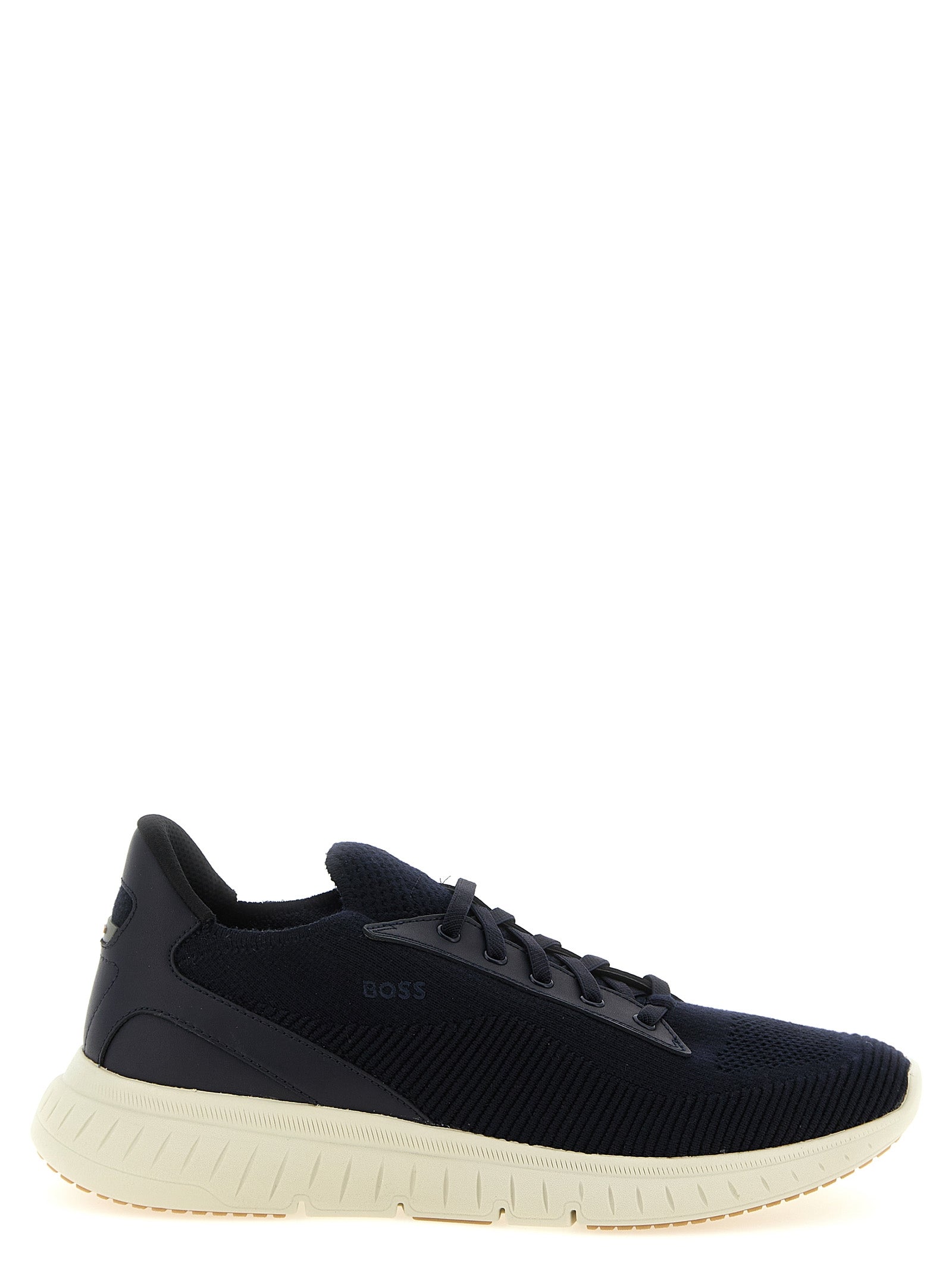 Sneakers athlétiques bleues Hugo Boss en cuir de vache, modernes et confortables, avec semelles blanches et design élégant.