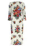 Robe midi blanche en viscose de Dolce & Gabbana, élégante et fluide, portée avec détails raffinés.