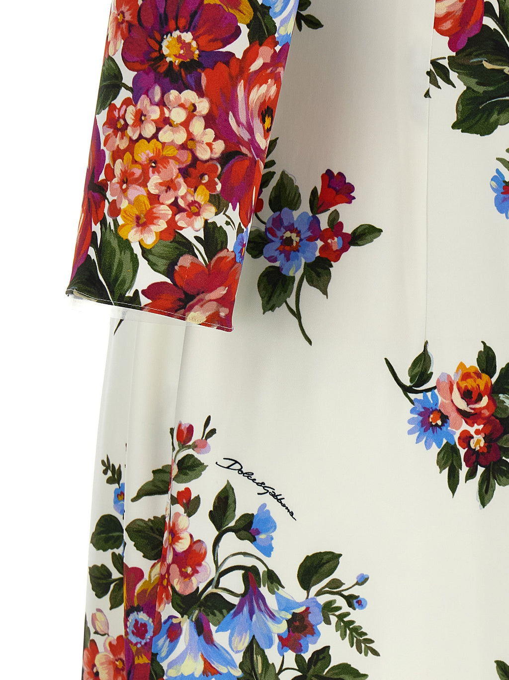 Robe midi blanche en viscose de Dolce & Gabbana, silhouette élégante avec détails raffinés, portée élégante et sophistiquée.