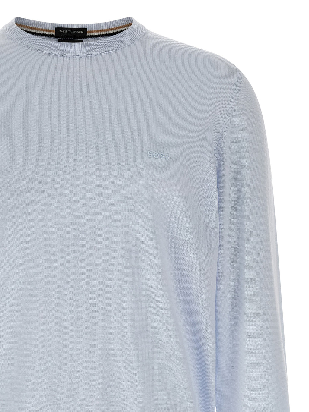 Cardigan en laine vierge bleue de Hugo Boss, manches longues et coupe élégante, porté sur un mannequin.